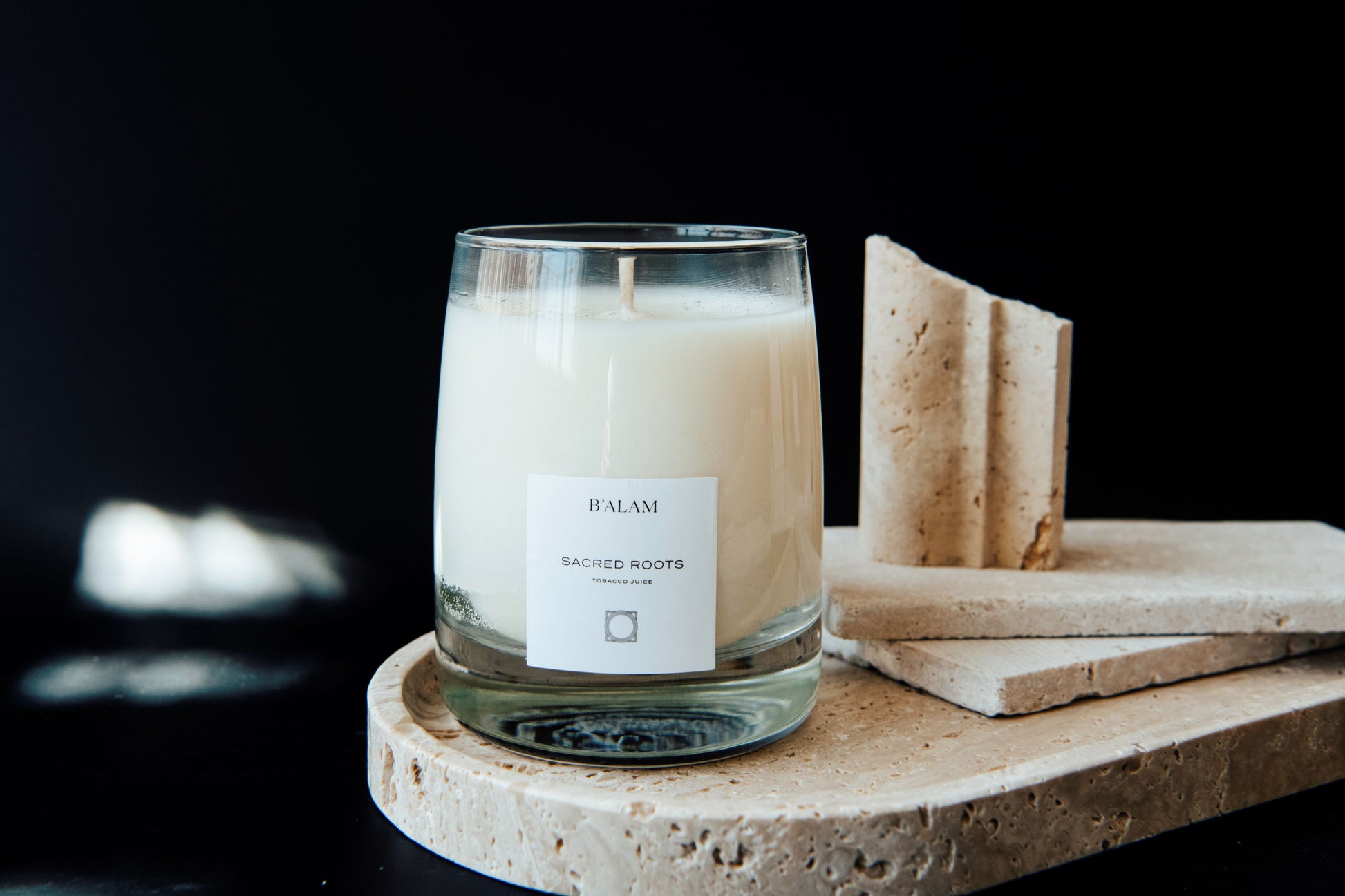 B'alam's Sacred Roots candle, scented with tobacco juice.