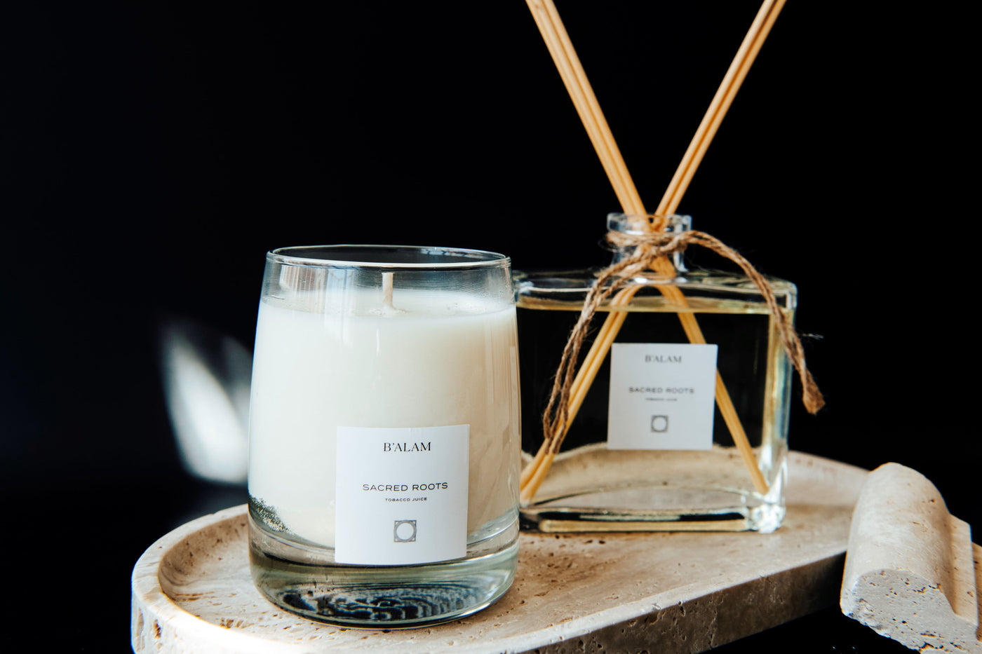 B'alam's Sacred Roots set, which includes a scented candle, a diffuser and Palo Santo.